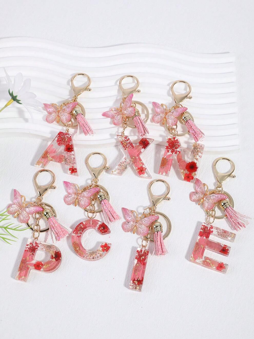 1pc Letter & Flower & Crystal & Tassel & Butterfly Keychain, Fashionable Bag Charm With Real Dried Flowers And Epoxy Resin