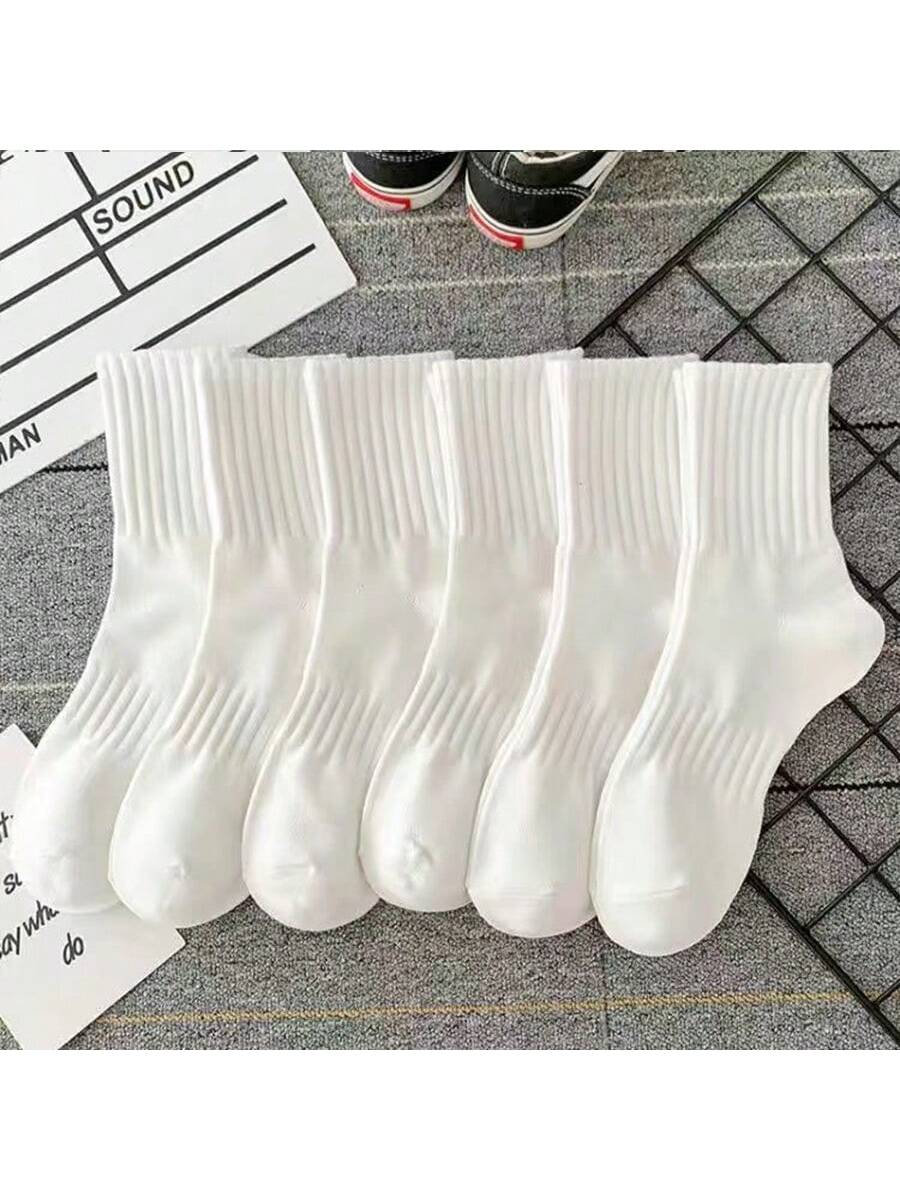 6 Pairs Of Women's High Stretch Waist Mid-Calf Socks In Black And White