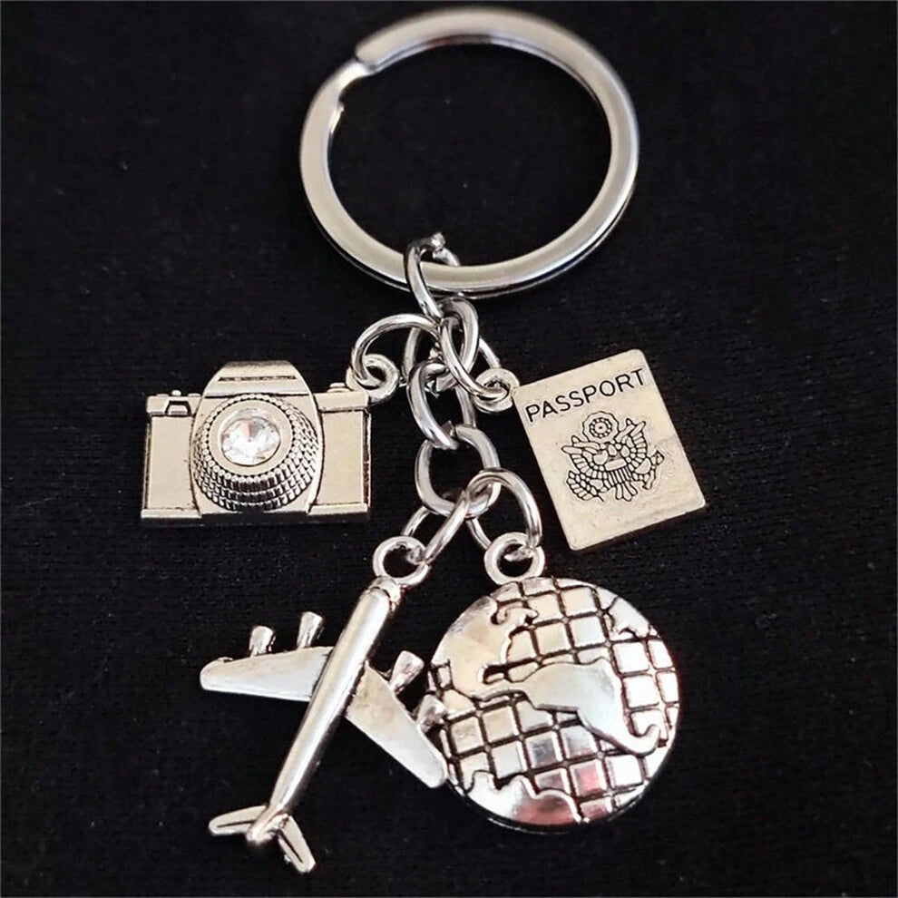 1pc, Cute Travel-Themed Silver Metal Keychain With Airplane, Globe, Camera And Books, Suitable For Bags, Cars And Keys Decoration, Gift