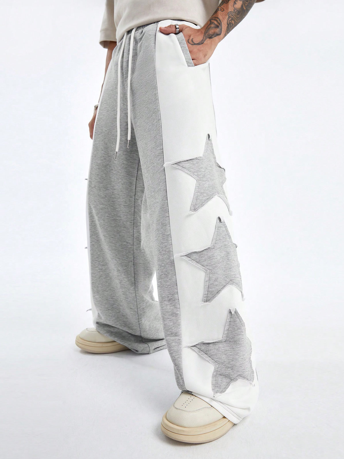 Manfinity StreetEZ Men's Loose Wide-Legged Long Pants With Double-Sided Star Pattern