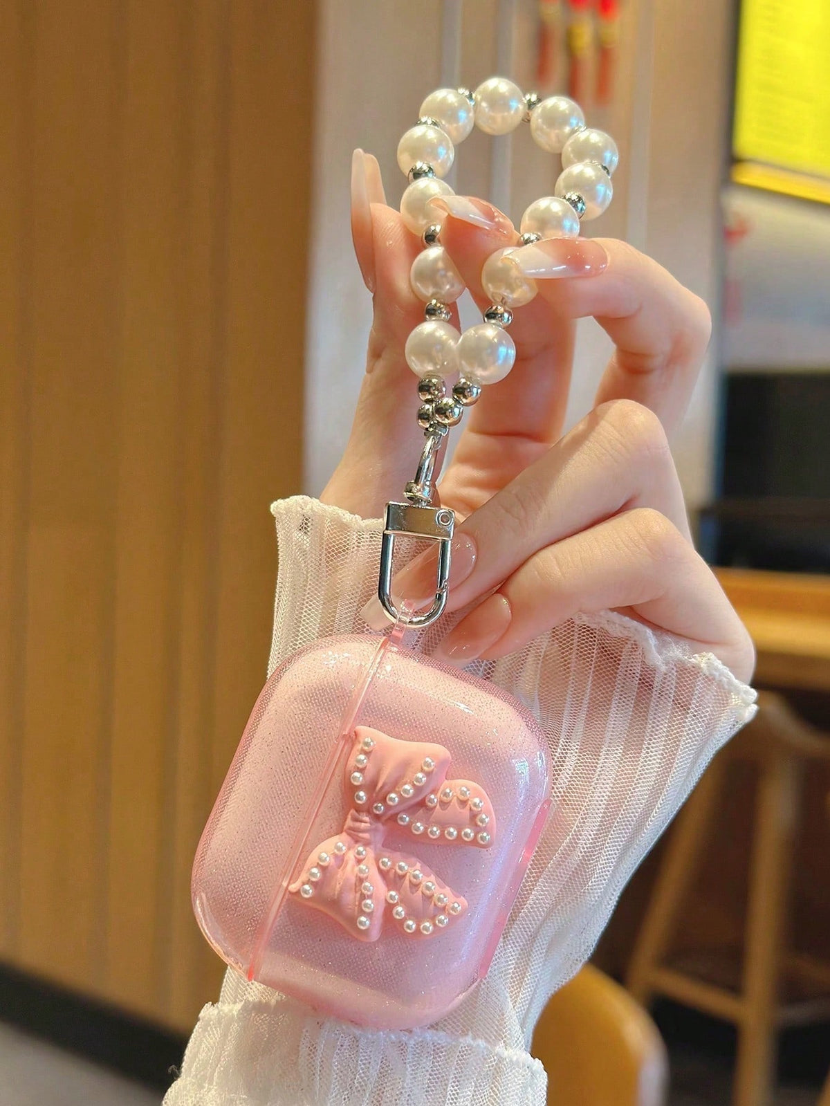 Baby Pink Transparent Glitter Earphone Case With Bowknot & Pearl Chain